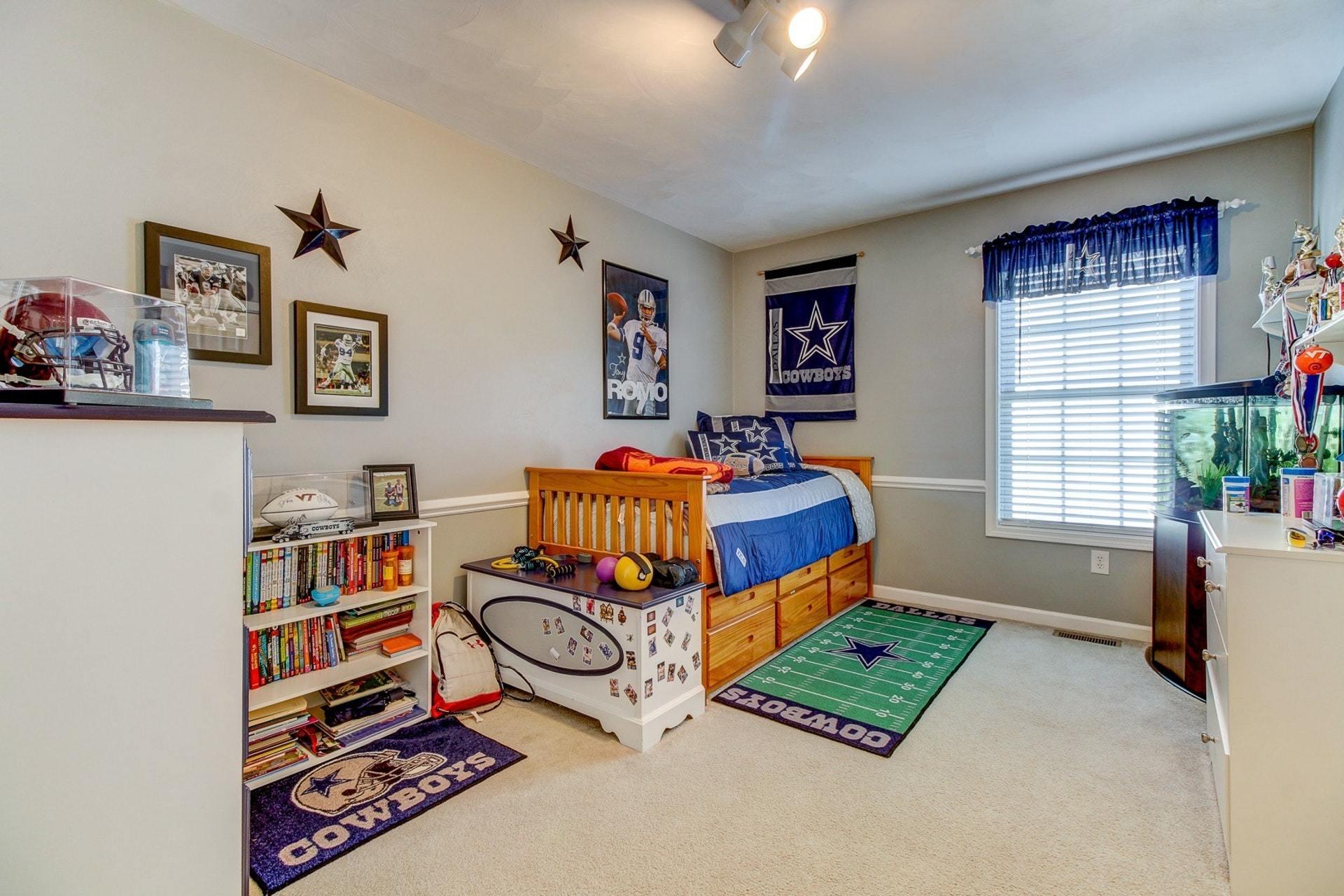 1737 Meadows Road Vinton, VA 24179 - Photo 16 of 37 a bedroom with a bed and a window
