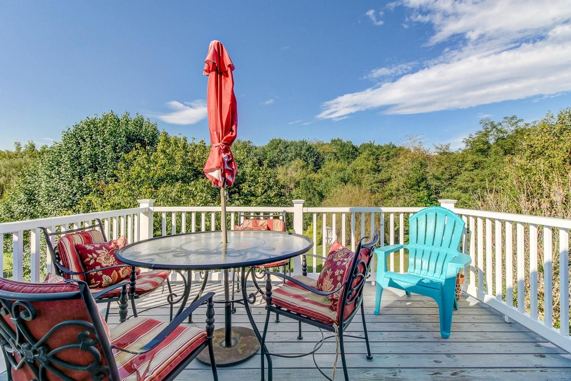 1737 Meadows Road Vinton, VA 24179 - Photo 19 of 37 a patio with a table and chairs
