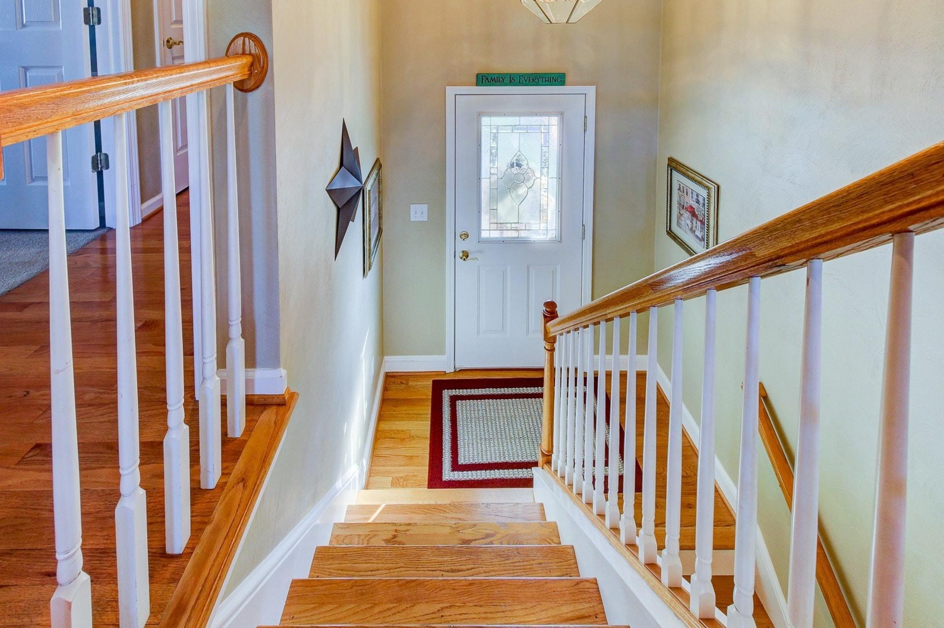 1737 Meadows Road Vinton, VA 24179 - Photo 3 of 37 a view of an entryway with wooden floor and stairs