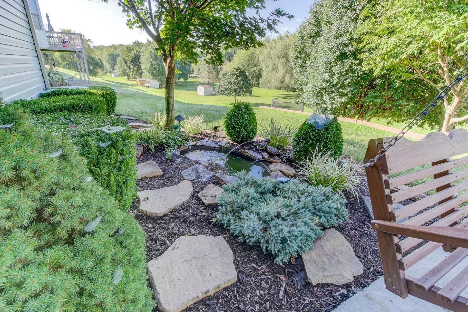 1737 Meadows Road Vinton, VA 24179 - Photo 29 of 37 a view of a garden with large trees