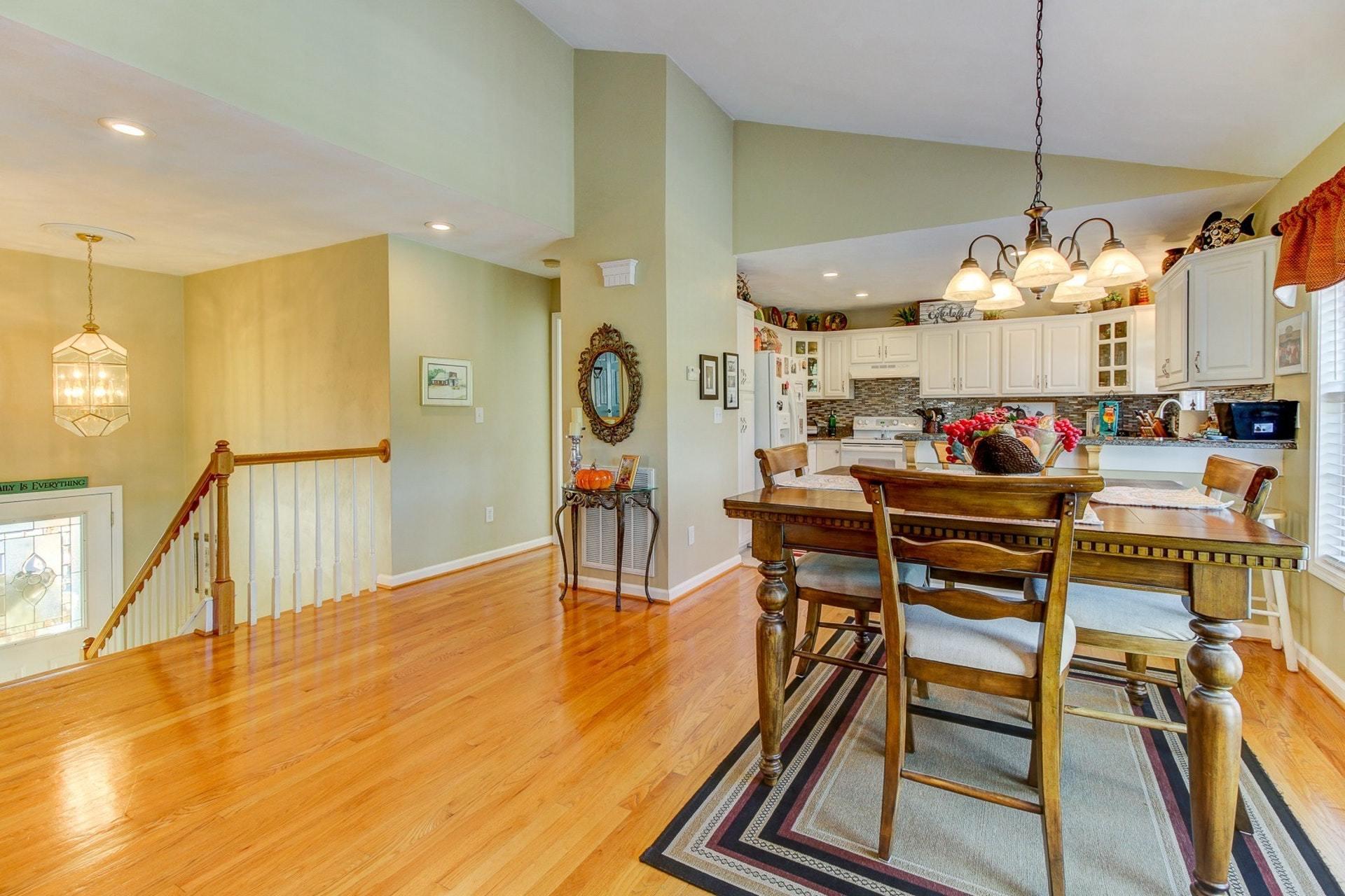 1737 Meadows Road Vinton, VA 24179 - Photo 7 of 37 a dining room filled with furniture and wooden floor