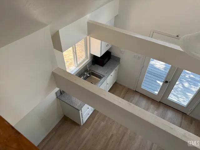a kitchen with a stove and a cabinet