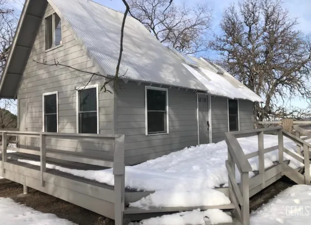 a front view of a house with porch