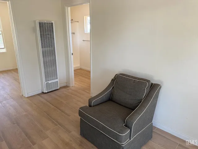 a bathroom with a sink a mirror and a window
