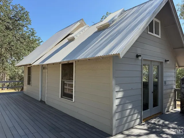 a front view of a house with garage
