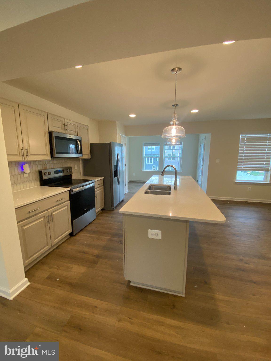 128 Tuxford Road Falling Waters, WV 25419 - Photo 4 of 27 Modern kitchen with sleek finishes.