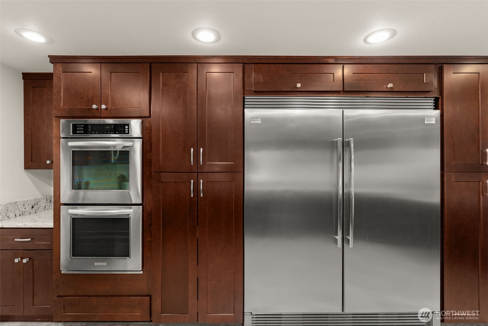 162 Southeast 16th Street Chehalis, WA 98532 - Photo 11 of 39 a metallic refrigerator freezer and a refrigerator in a kitchen