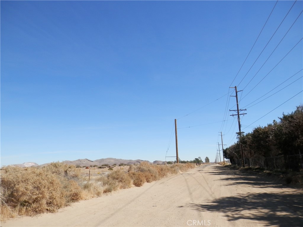 0 Dawn Road Rosamond, CA 93560 - Photo 6 of 13 a view of a road with a snow on the background