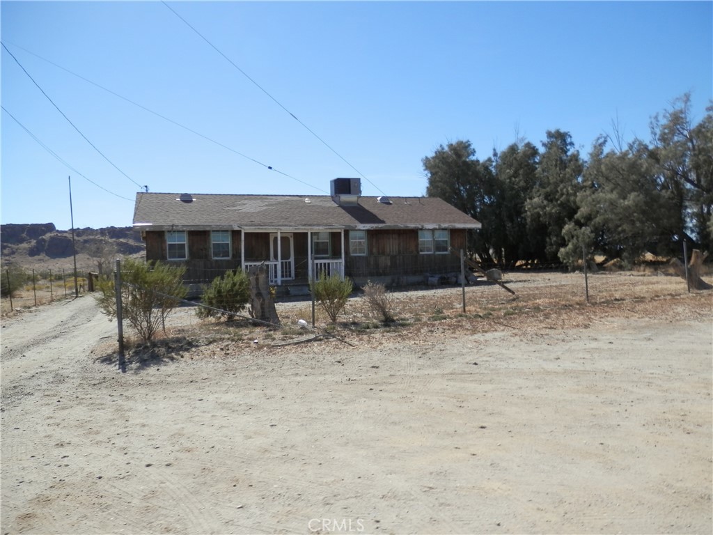 0 Dawn Road Rosamond, CA 93560 - Photo 8 of 13 a view of a house with a yard covered in snow