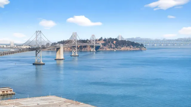 a living room with furniture and a lamp