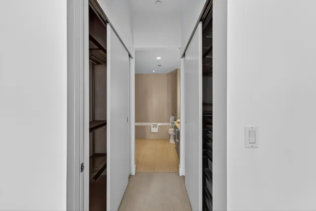 a bathroom with a shower and a sink