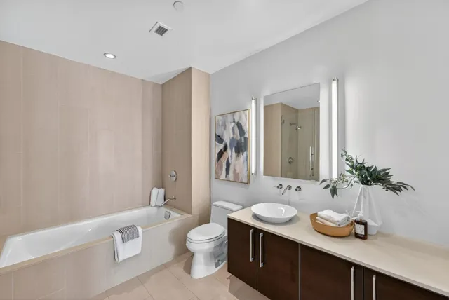 a outdoor living space with furniture and a potted plant