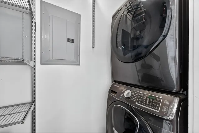 a stove top oven sitting inside of a kitchen