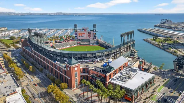 a picture of a table and chairs in wooden floor