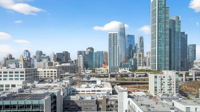 a view of city with tall buildings