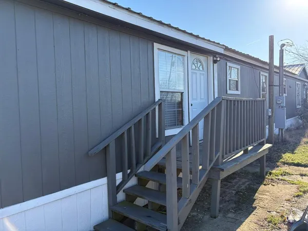 a view of balcony and wooden floor