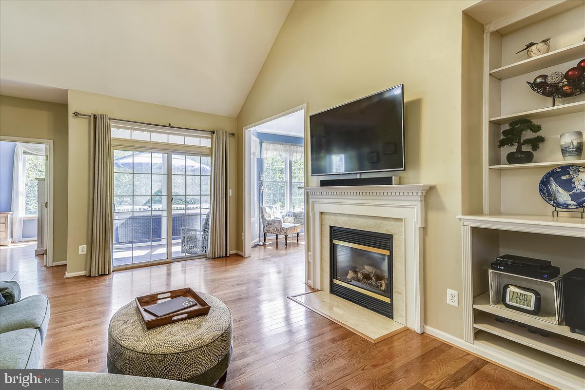Cozy Gas Fireplace with built ins.