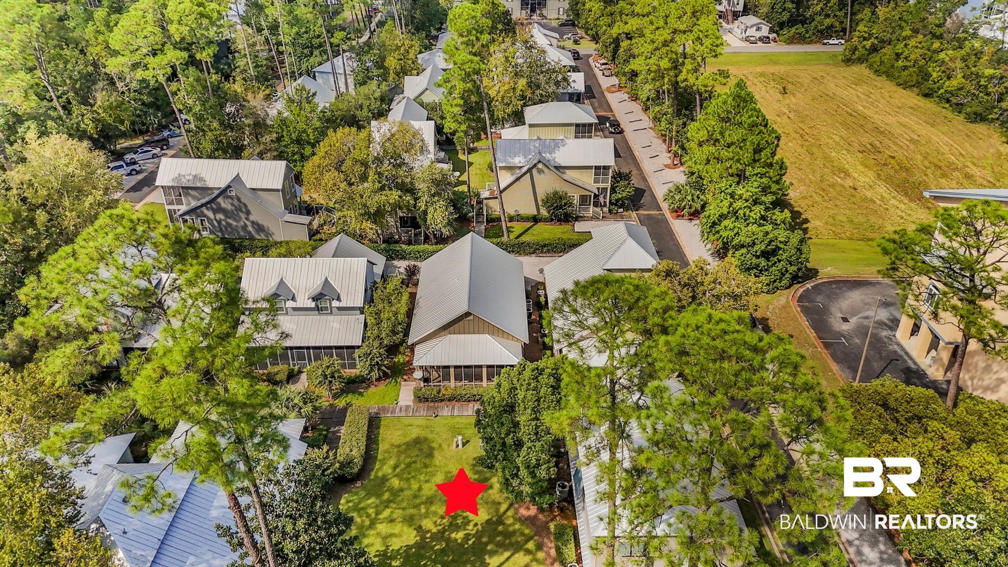 25773 Canal Road Orange Beach, AL 36561 - Photo 14 of 32 Drone / aerial view of a tree filled landscape