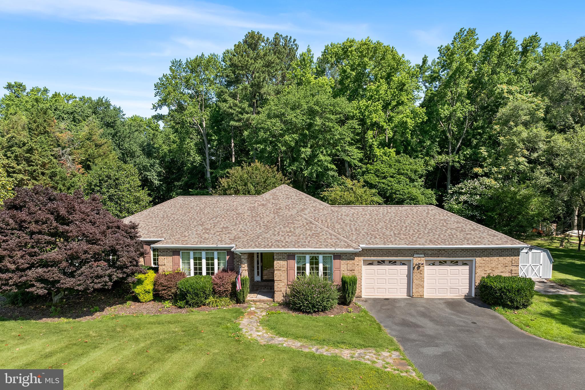 front view of a house and a yard