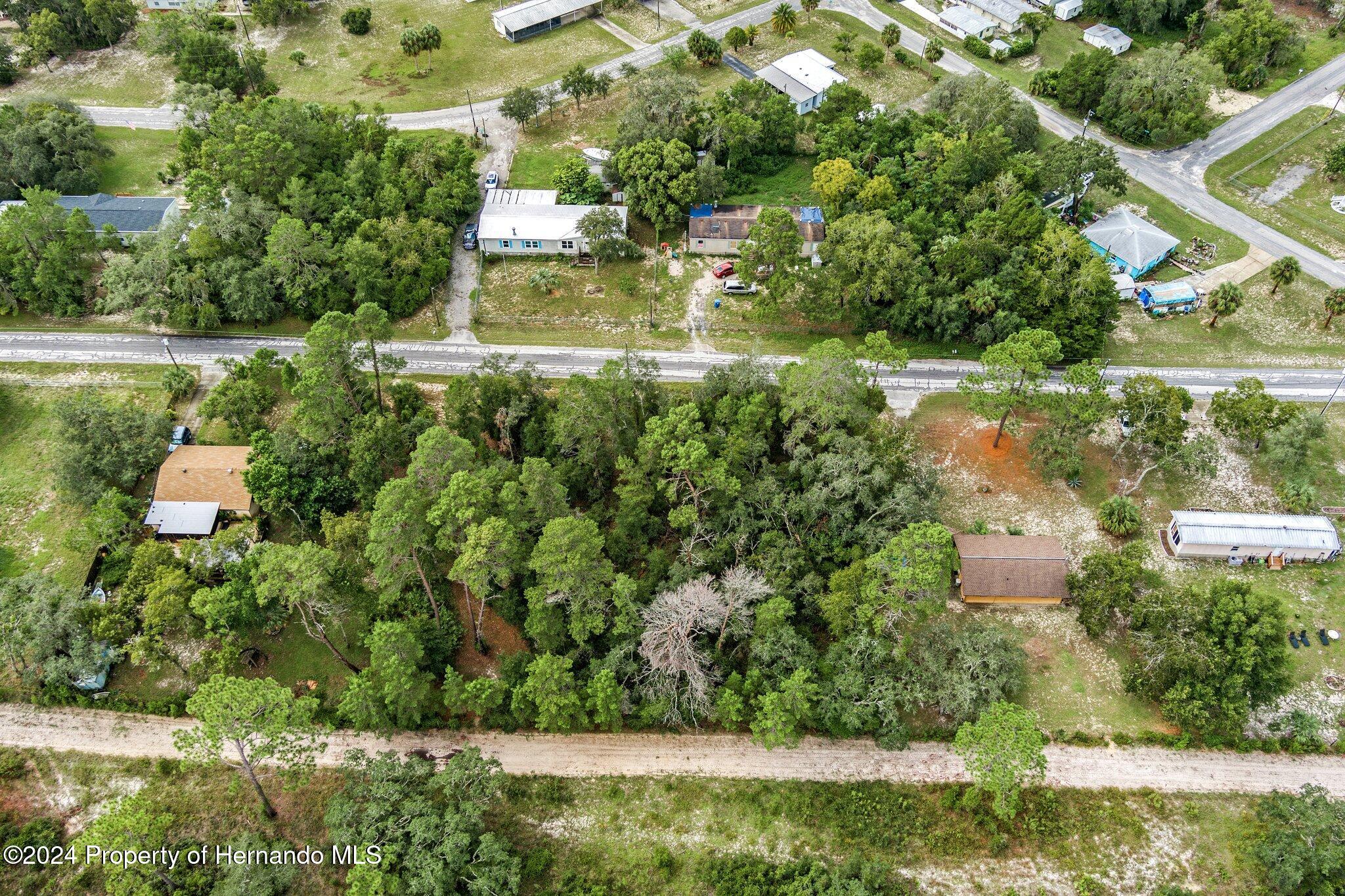 8055 Filson Street Weeki Wachee, FL 34613 - Photo 17 of 30 a view of a lake with outdoor space
