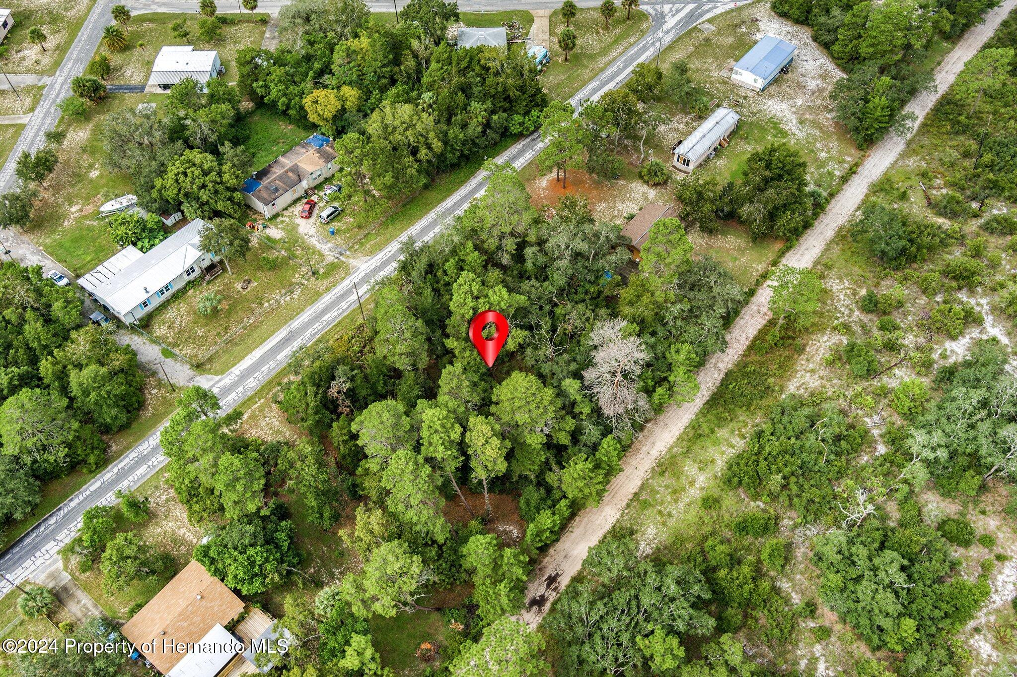 8055 Filson Street Weeki Wachee, FL 34613 - Photo 18 of 30 an aerial view of residential houses with outdoor space
