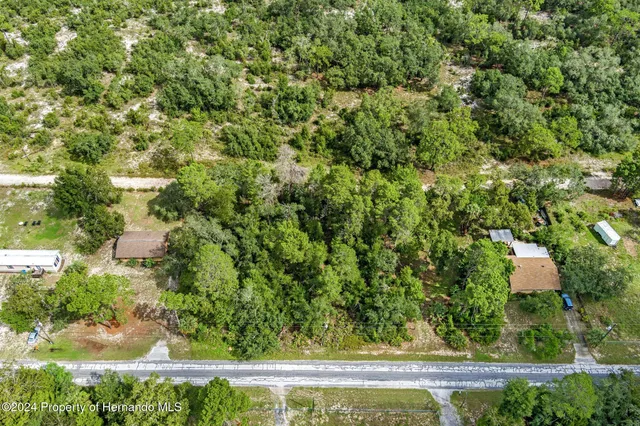 a view of a house with a street