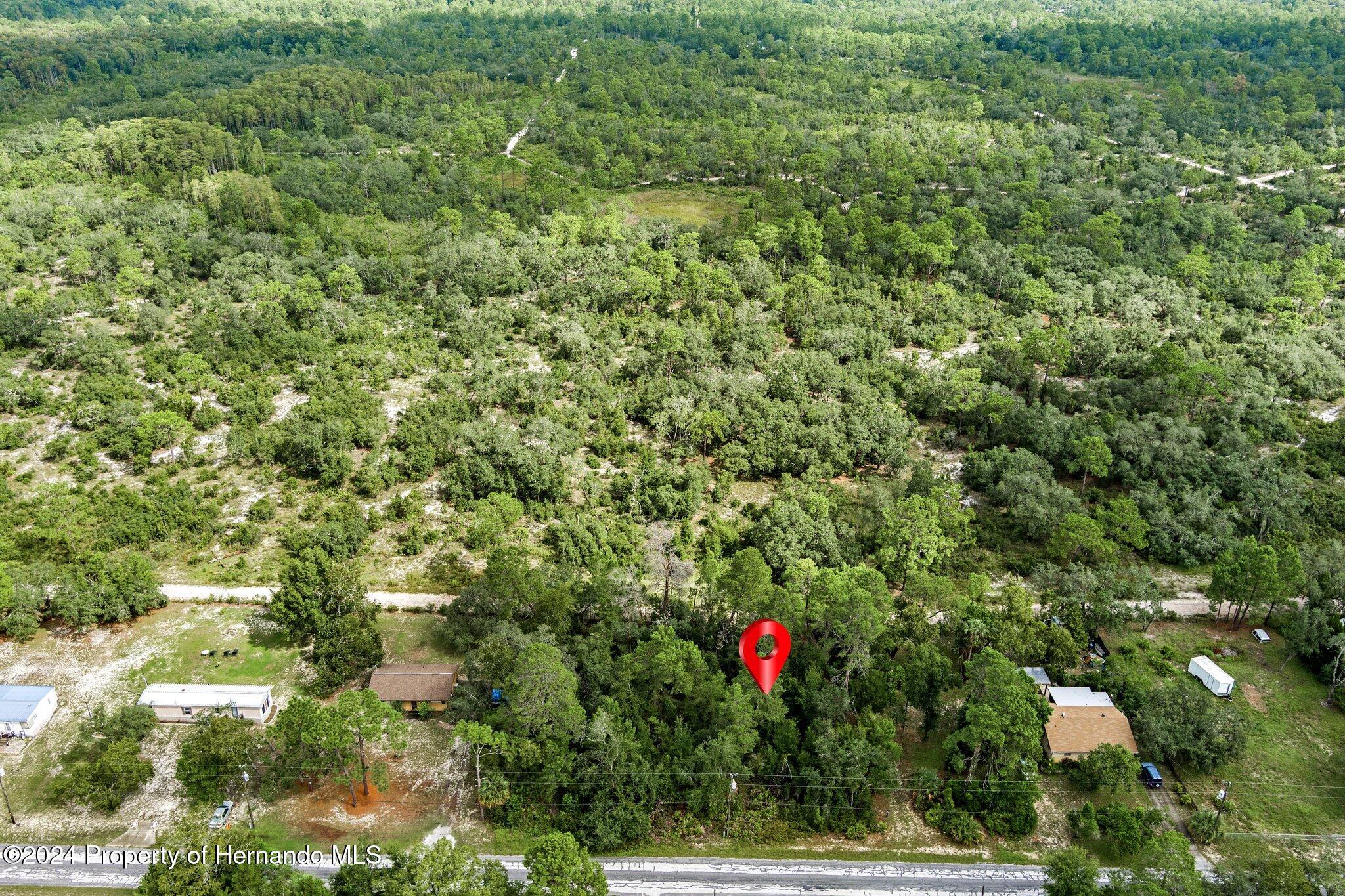 8055 Filson Street Weeki Wachee, FL 34613 - Photo 6 of 30 a view of a house with a street