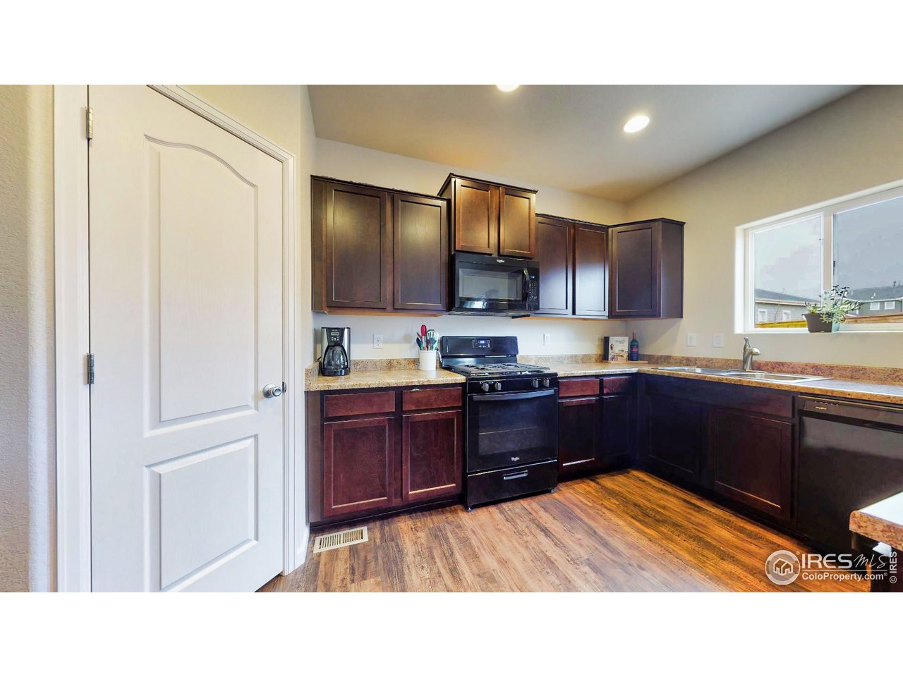 2877 Big Thunder Road Berthoud, CO 80513 - Photo 5 of 19 Lots of cabinets and counter space in the kitchen.