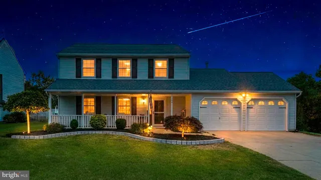 a house view with a swimming pool