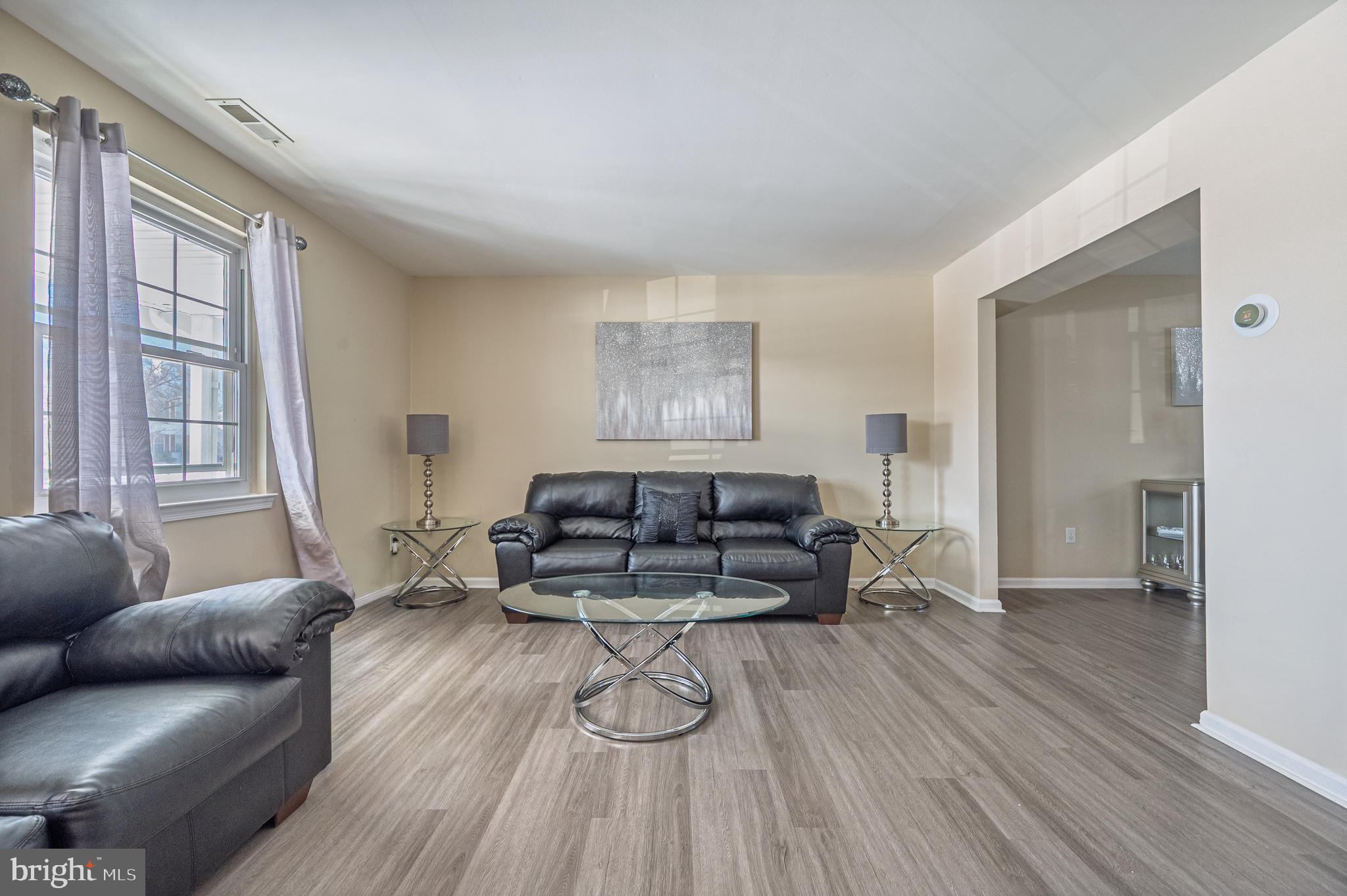 12 Persimmon Street Sicklerville, NJ 08081 - Photo 5 of 33 a living room with furniture and a wooden floor