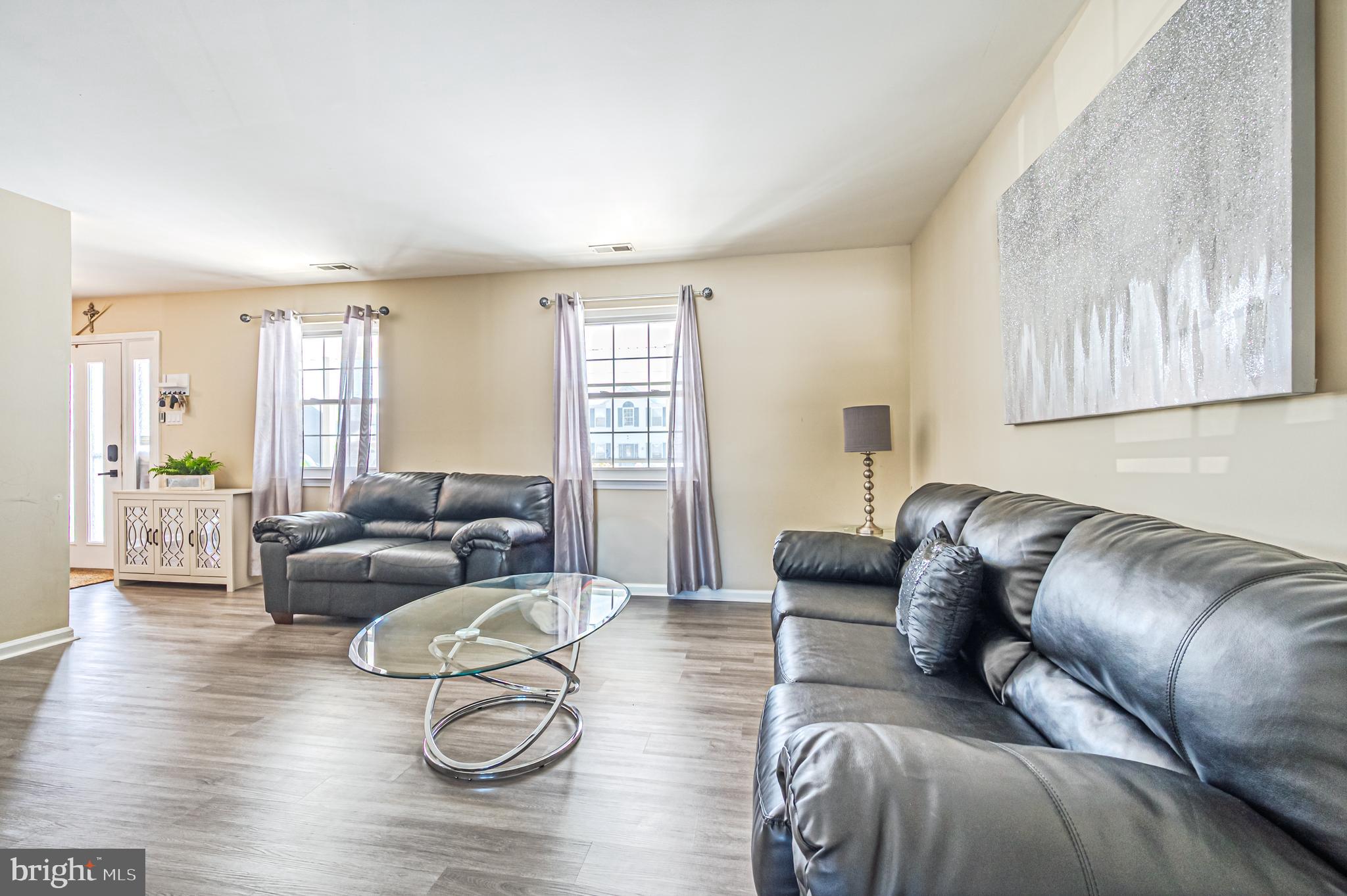12 Persimmon Street Sicklerville, NJ 08081 - Photo 6 of 33 a living room with furniture or couch and a wooden floor