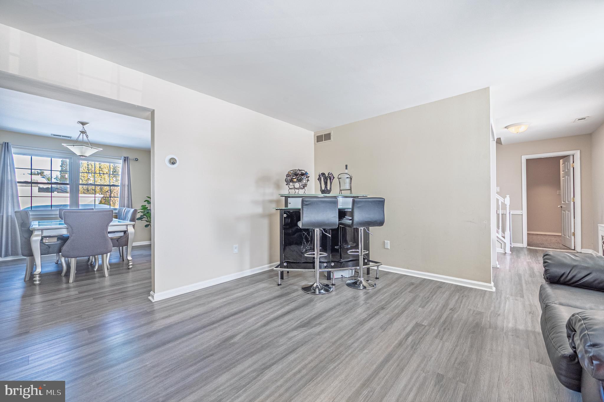 12 Persimmon Street Sicklerville, NJ 08081 - Photo 7 of 33 a view of a livingroom with furniture and a workspace