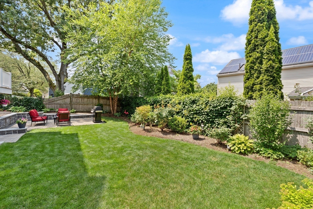 89 Dwinell Street Boston, MA 02132 - Photo 27 of 37 a couple of cars parked in front of a house