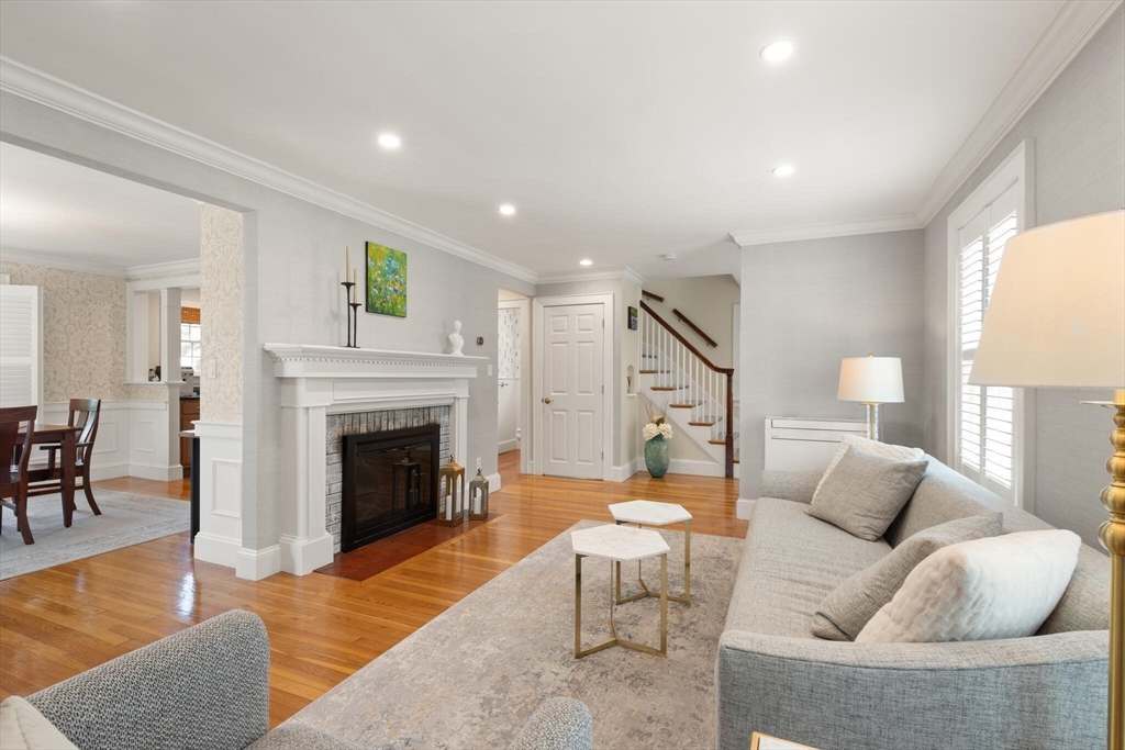 89 Dwinell Street Boston, MA 02132 - Photo 5 of 37 a living room with furniture and a fireplace