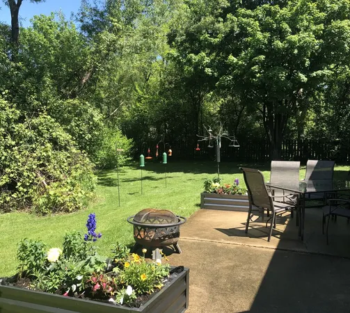 a garden view with a seating space