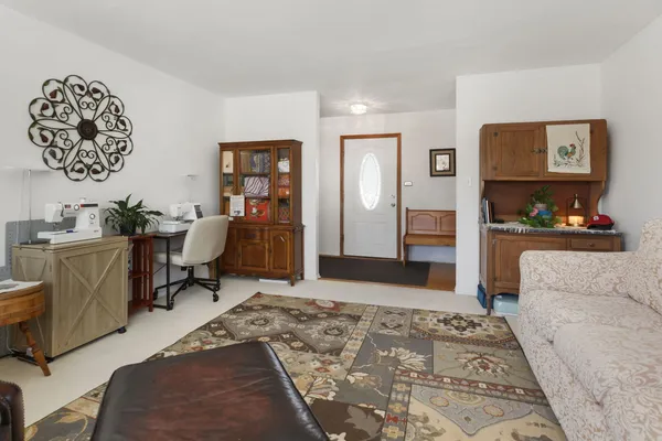 a workspace with furniture and window