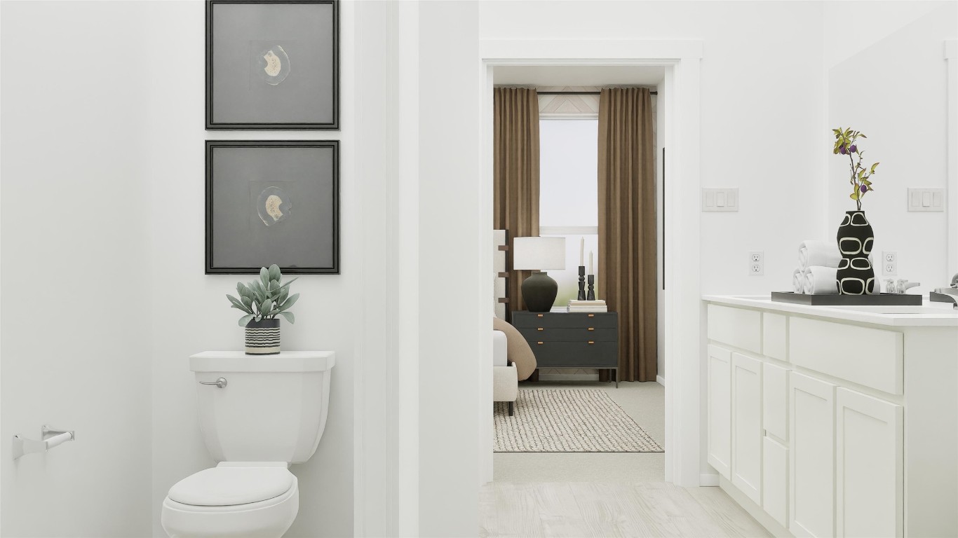 113 Stumpy Street San Marcos, TX 78666 - Photo 24 of 30 a bathroom with a sink a toilet and shower