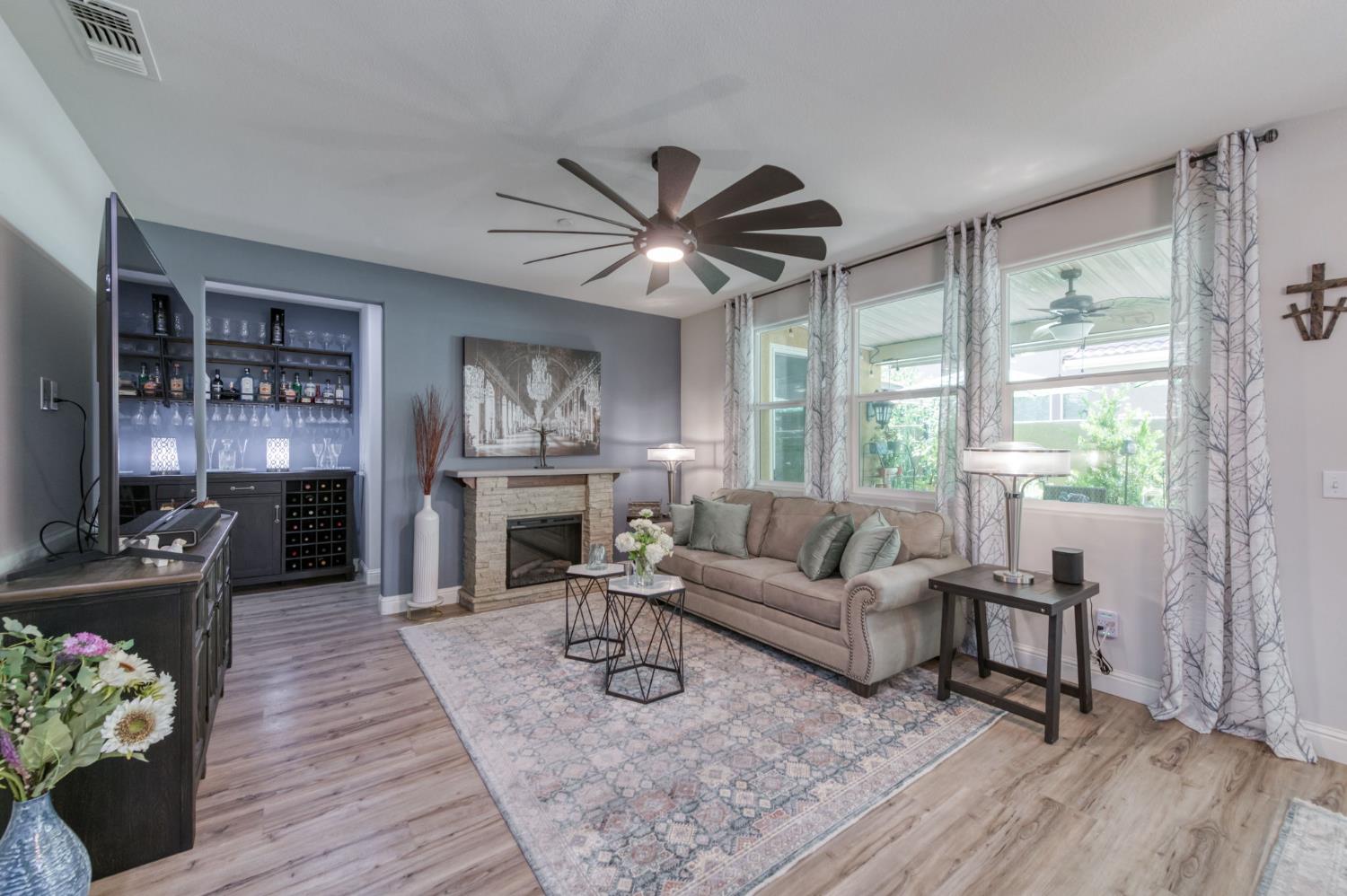 3562 Luminary Way Clovis, CA 93619 - Photo 12 of 40 a living room with furniture and a large window