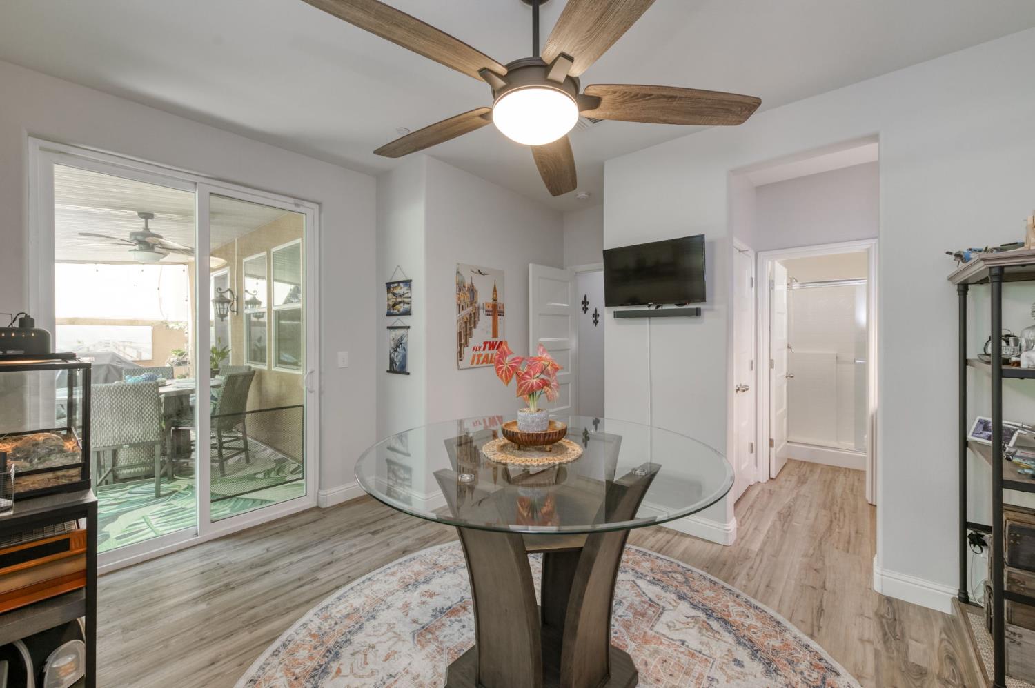 3562 Luminary Way Clovis, CA 93619 - Photo 16 of 40 a dining room with furniture and wooden floor