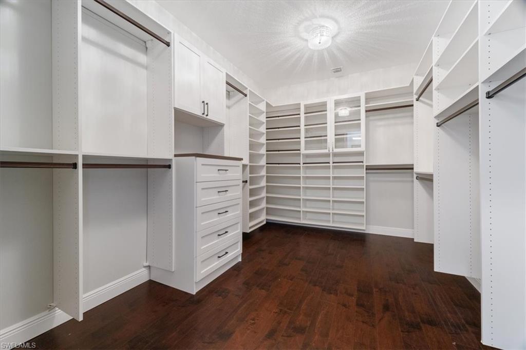 5135 Genoa Street Ave Maria, FL 34142 - Photo 20 of 35 a view of an empty walk in closet