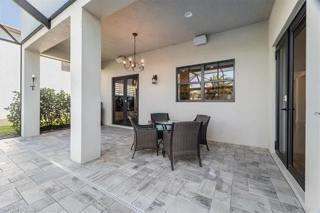 a view of a couches and table in the patio
