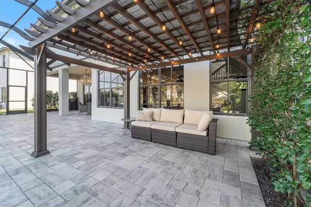 a view of outdoor space with seating and green space