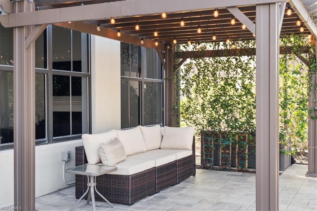 5135 Genoa Street Ave Maria, FL 34142 - Photo 30 of 35 a view of outdoor space with seating and green space