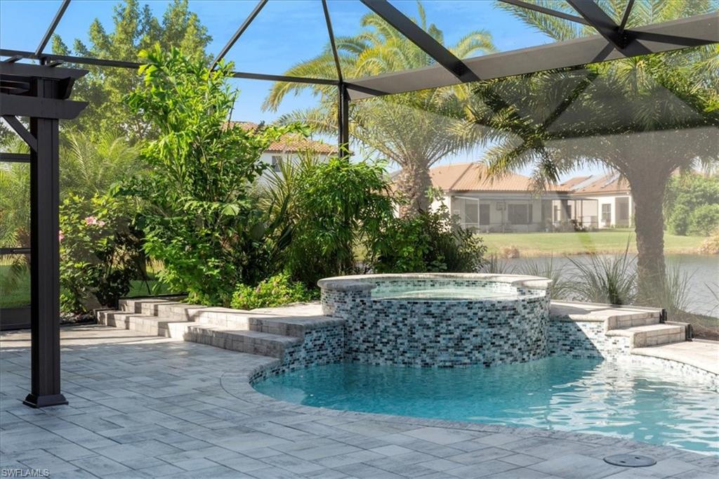 5135 Genoa Street Ave Maria, FL 34142 - Photo 31 of 35 a view of outdoor space yard and patio