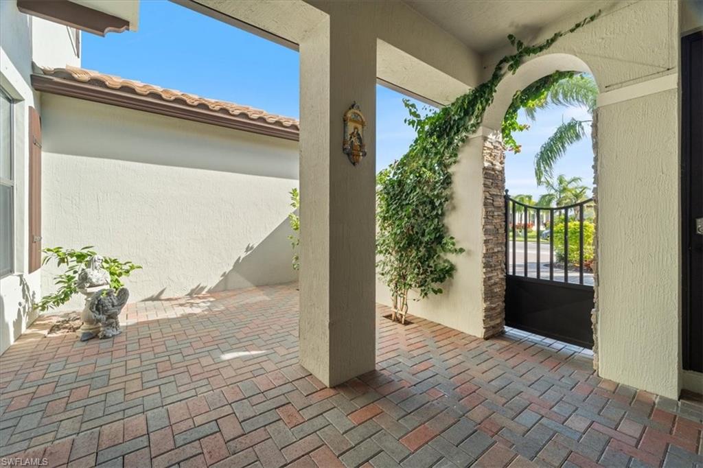 5135 Genoa Street Ave Maria, FL 34142 - Photo 9 of 35 a view of entryway with wooden floor