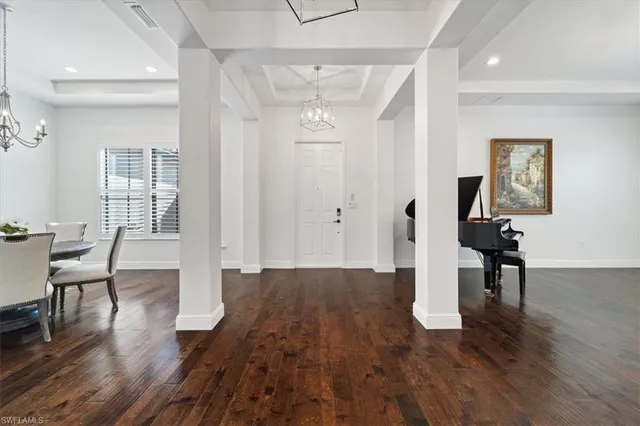 a view of a livingroom with furniture and wooden floor