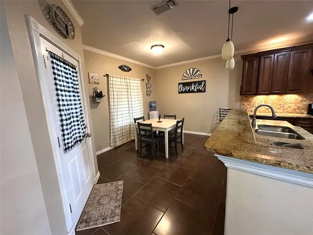 a view of a livingroom with furniture and window