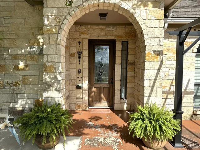 a front view of a house with glass door