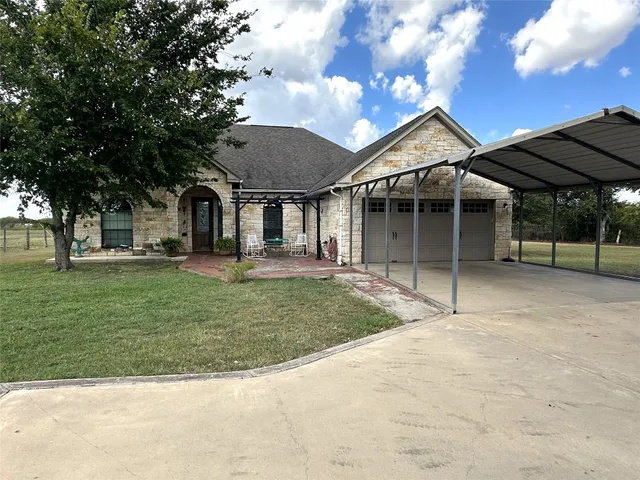 a view of outdoor space with deck and trees