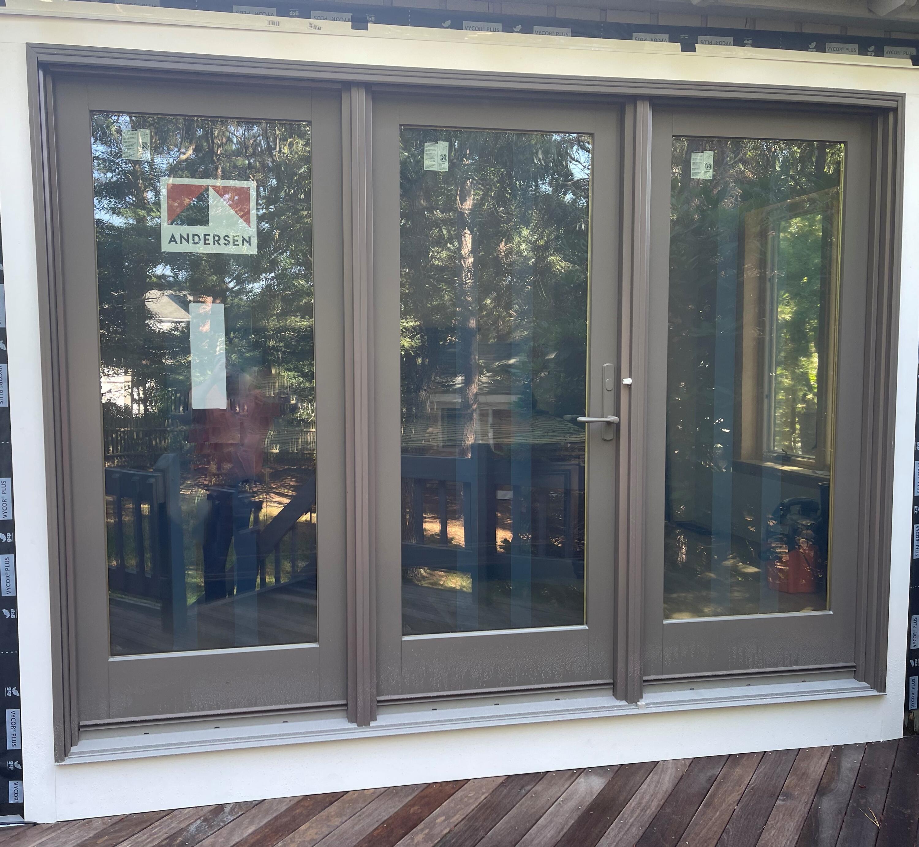 87 Tracey Road Cotuit, MA 02635 - Photo 32 of 33 a glass window with a glass door